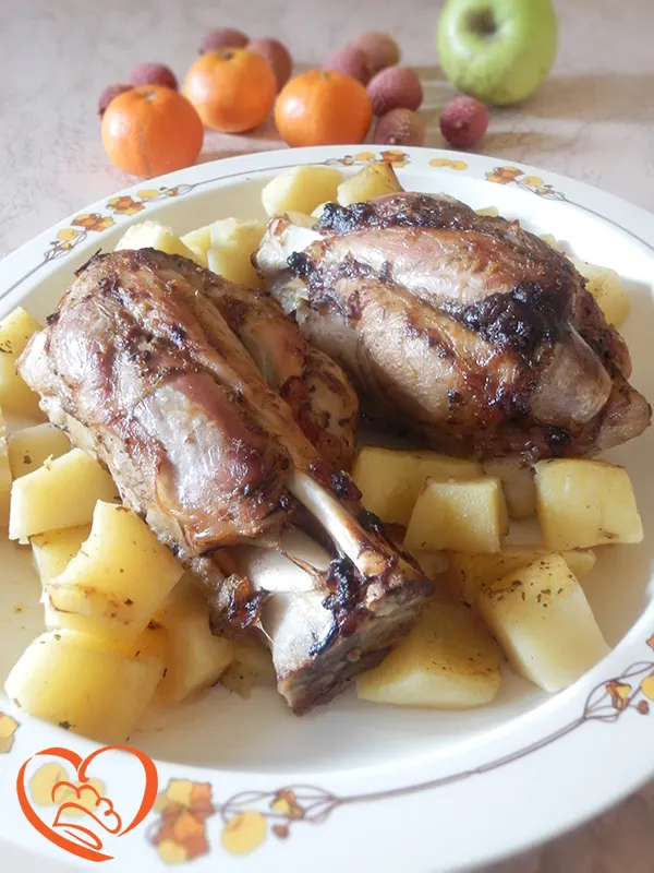 Stinco di maiale allo spumante con patate